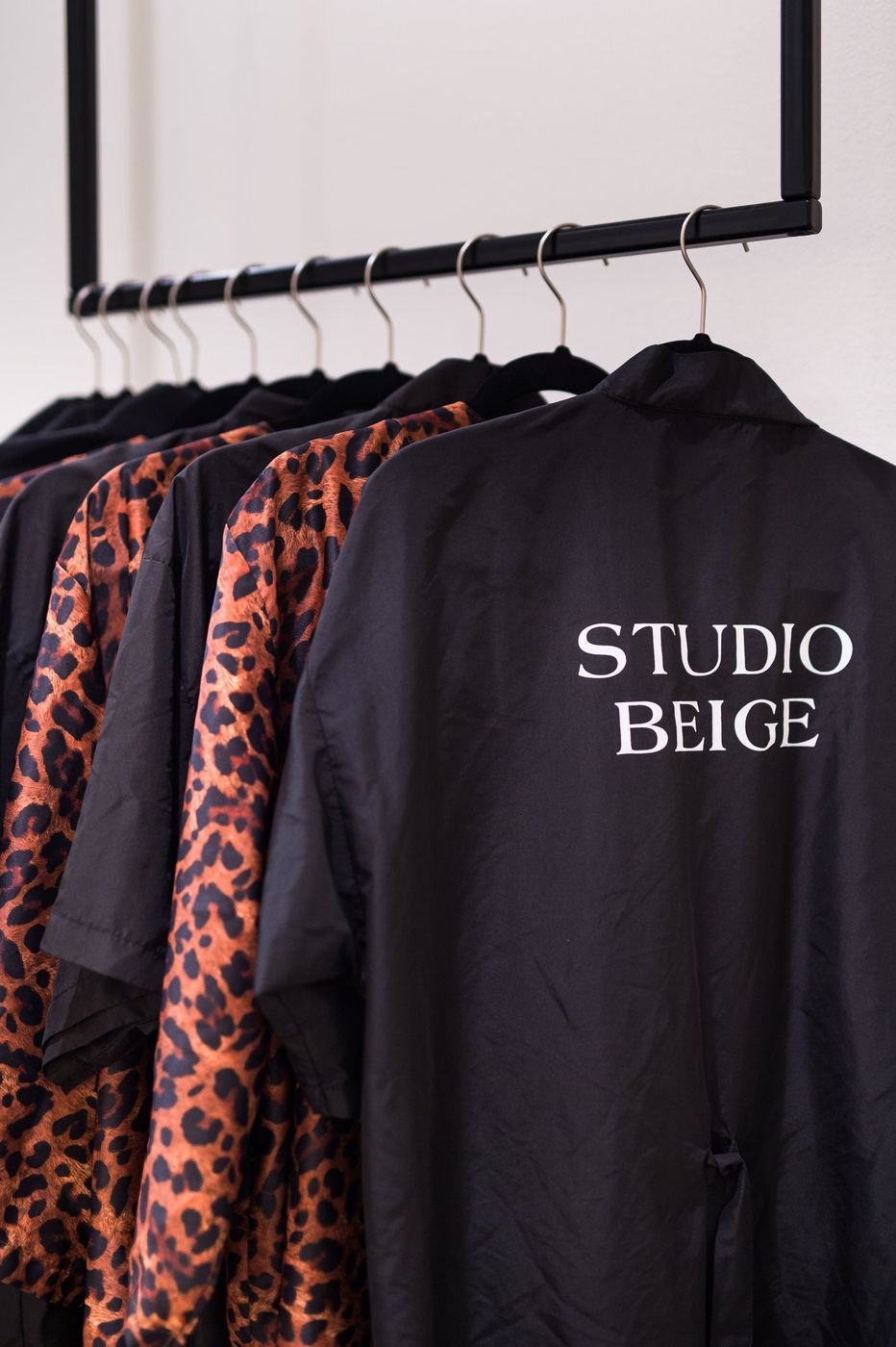 Studio Beige neon sign — salon branding