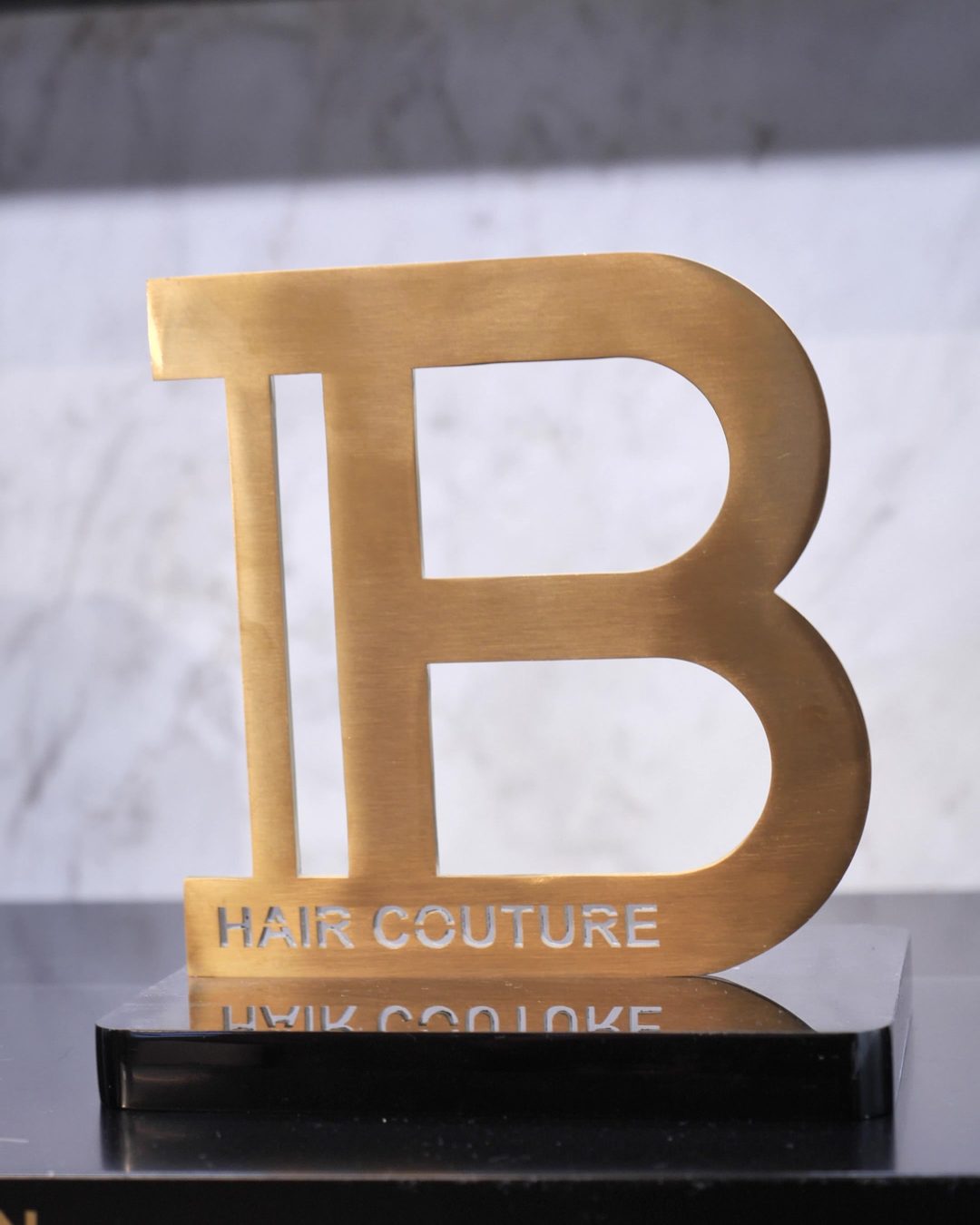 The gold Balmain Hair Couture B at the house in Amsterdam