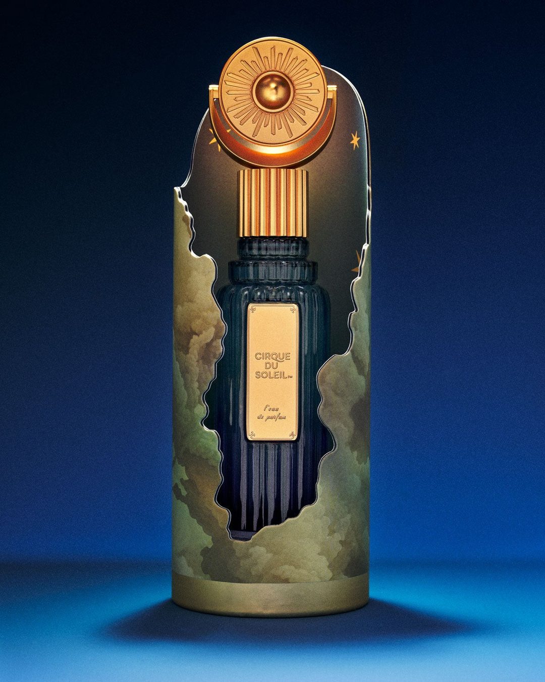 The gold sun-and-moon stopper and Art Deco top of the Cirque du Soleil L'eau de Parfum bottle