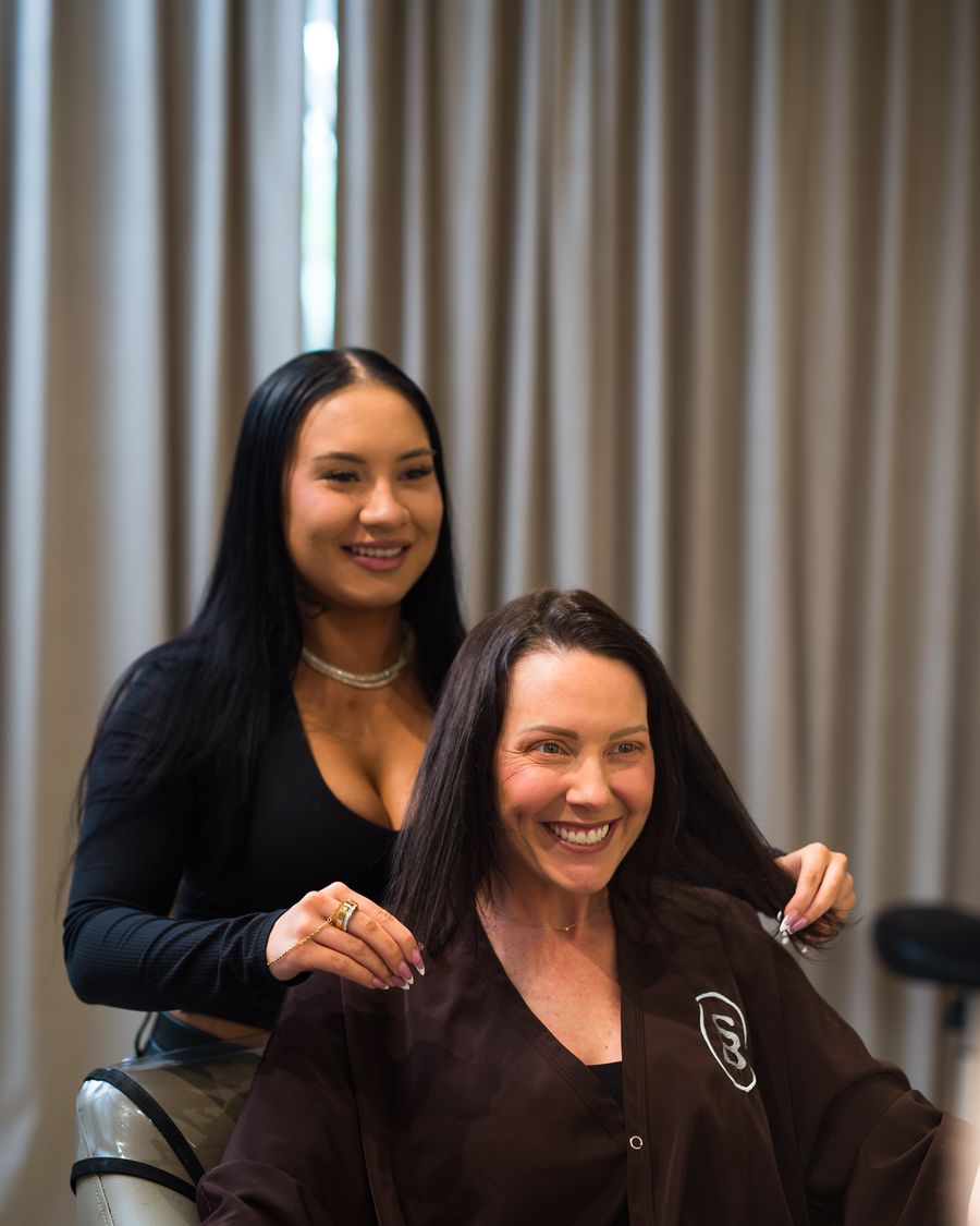 Faith Hall with her client after the extension install