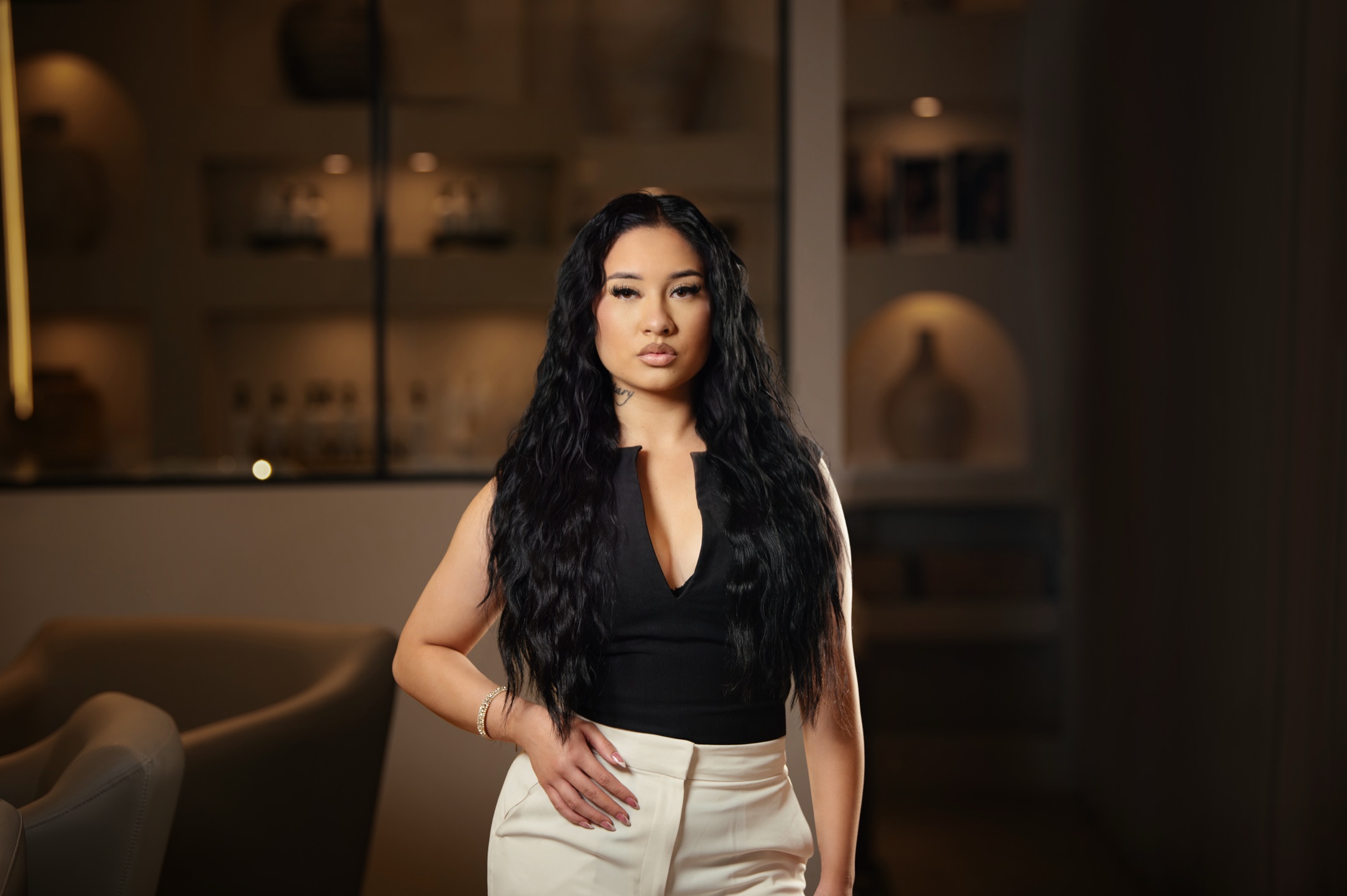 Long, voluminous wavy hair extensions by Studio Beige on the Emerald Coast